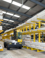 Inside our warehouse with a forklift handling Silktrim products